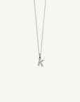 18k white gold diamond initial pendant. Luxury custom design. Initial K.