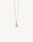 18k yellow gold diamond initial pendant. Luxury custom design. Initial K.