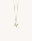 18k yellow gold diamond initial pendant. Luxury custom design. Initial M.