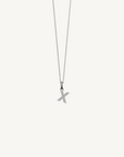 18k white gold diamond initial pendant. Luxury custom design. Initial X.