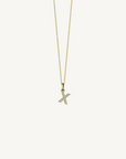 18k yellow gold diamond initial pendant. Luxury custom design. Initial X.