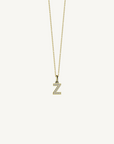 18k yellow gold diamond initial pendant. Luxury custom design. Initial Z.