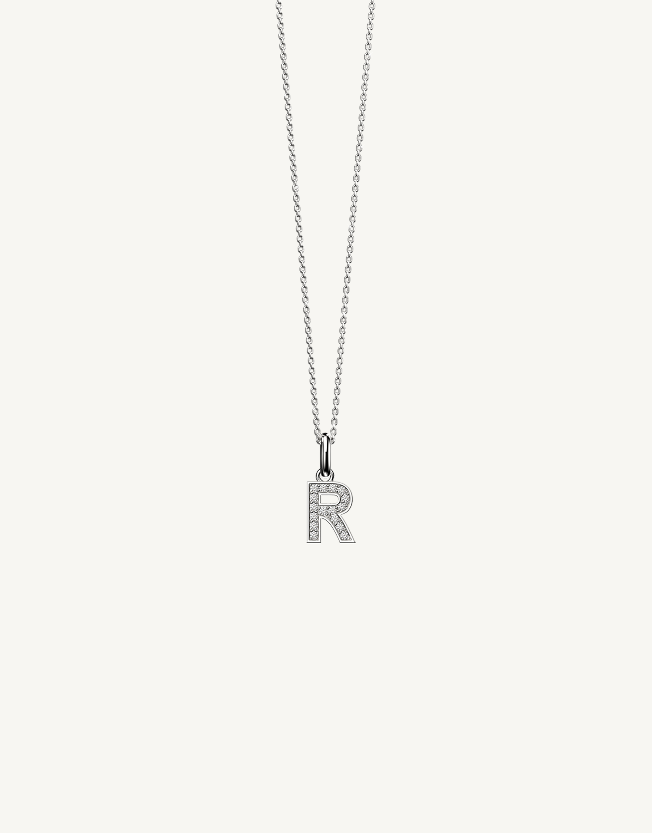 18k white gold diamond initial pendant. Luxury custom design. Initial R.